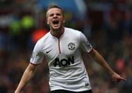 Tom Cleverley celebrates after scoring Manchester United's third goal